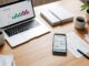 Personal finance dashboard on laptop and smartphone showcasing budgeting and investment tools for smart money management.